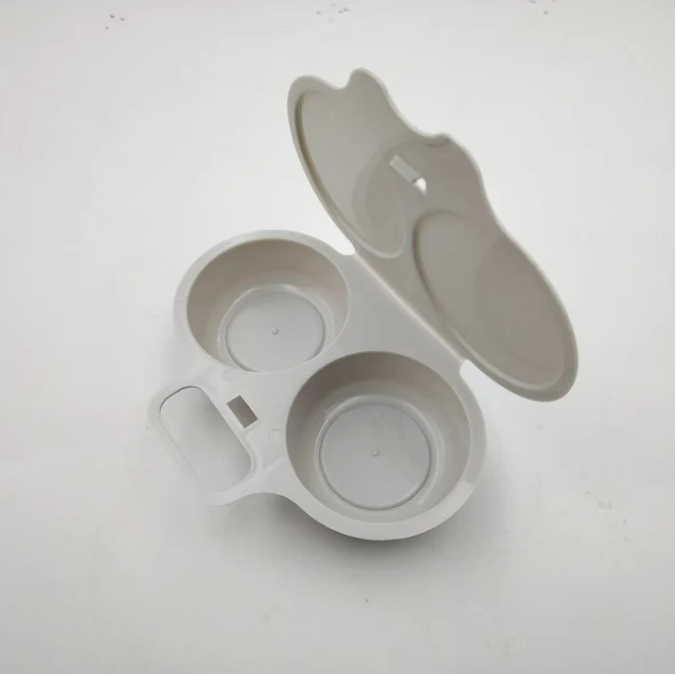 🥳2026 HOT SALE🥳💞50K+ SOLD! 🥚✨ 50% OFF + BUY 1 GET 1 FREE! Dual Cavity Microwave Egg Poacher – Quick oil‑free cooking, food‑grade PP & versatile. Perfect for busy mornings – healthy breakfast in minutes! ⚡🍳