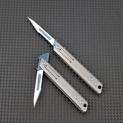 🔪 Titanium Mini Utility Knife – 10 Replaceable Blades