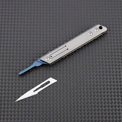 🔪 Titanium Mini Utility Knife – 10 Replaceable Blades